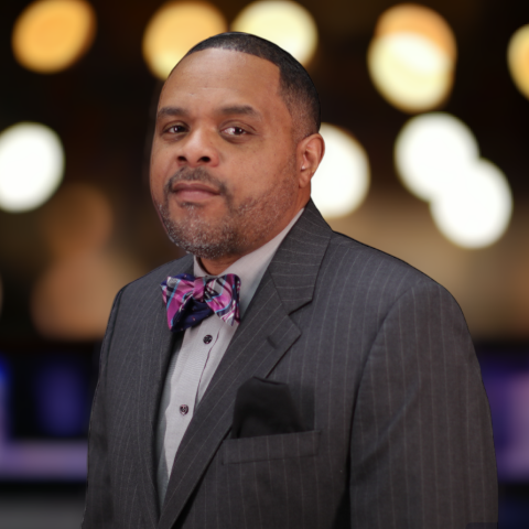 Profile headshot photo of Ryan Hill, MPA.