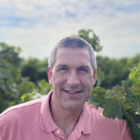 Profile headshot photo of Mark Burke, PhD.