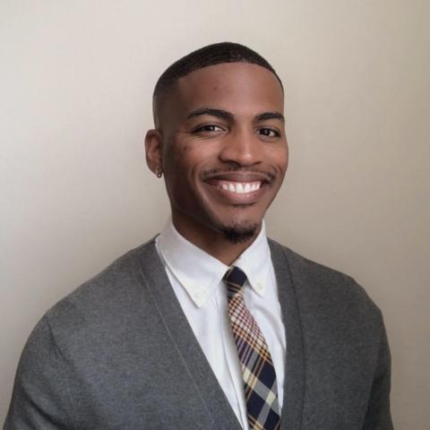Profile headshot photo of MarQuis Bullock, MLIS.