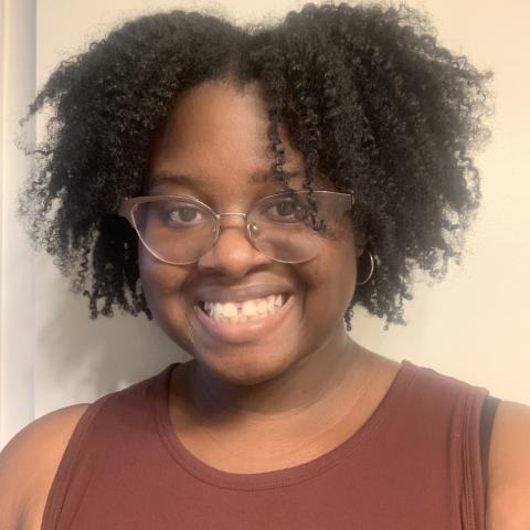 Profile headshot photo of Alexis Woolford.