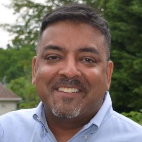 Profile headshot photo of Rob Singh.
