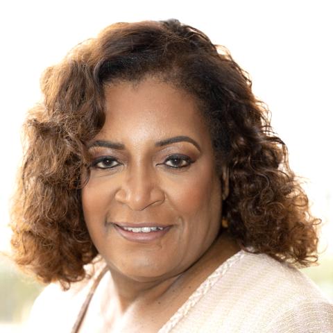 Profile headshot photo of Tanya Penny Woods.