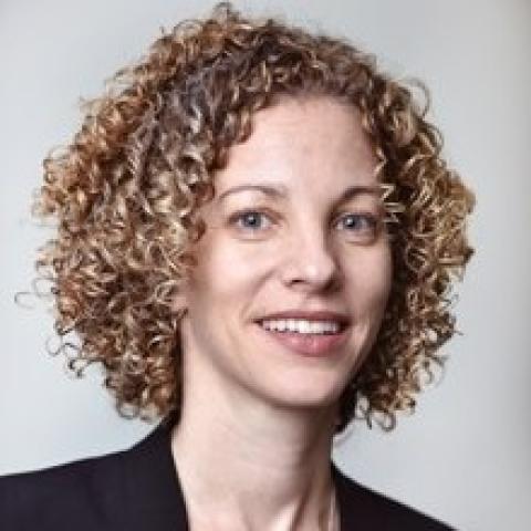 Profile headshot photo of Valerie Schneider.