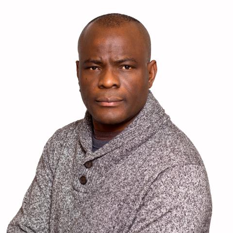 Profile headshot photo of Segun Ige, PhD.