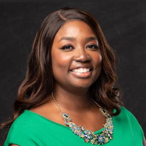 Profile headshot photo of Genesis Neely.