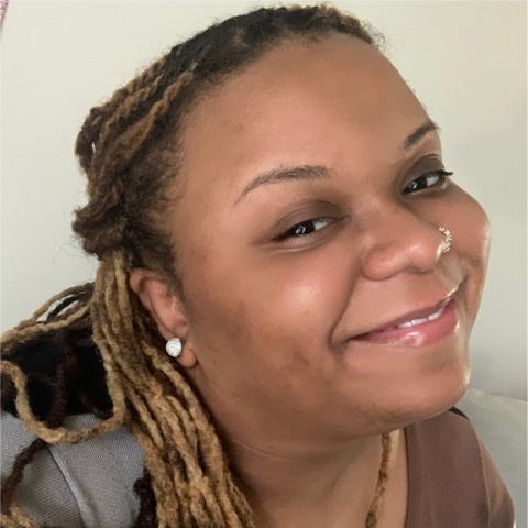 Profile headshot photo of Iesha Washburn.