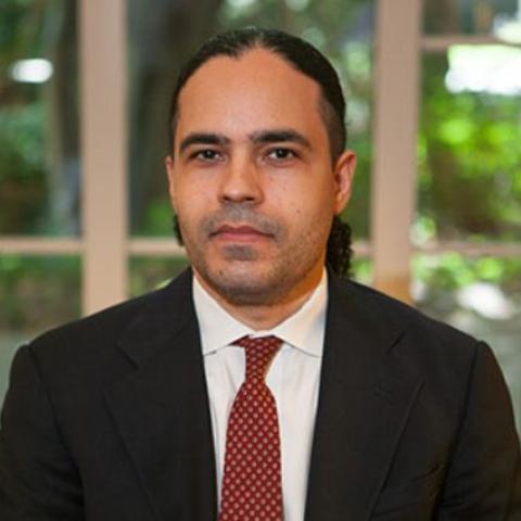 Profile headshot photo of Reynaldo Ortíz-Minaya.