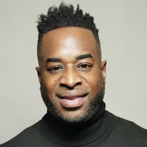 Profile headshot photo of Damien LeChateau Sneed.