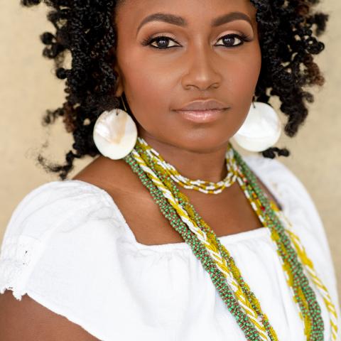 Profile headshot photo of Iya Ifanike Batts.