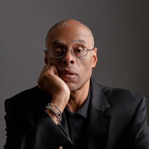 Profile headshot photo of Lateef Mtima.