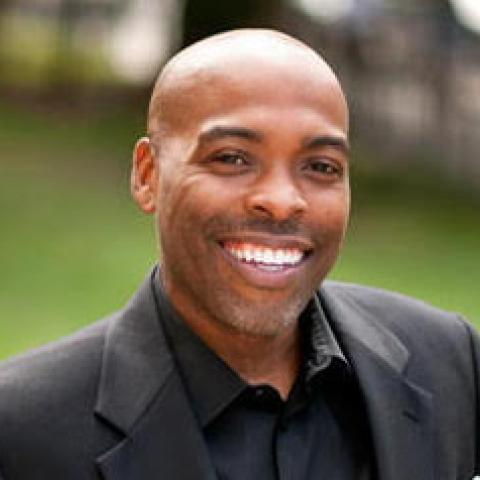 Profile headshot photo of Curtis Kidd Telemaque, PhD.