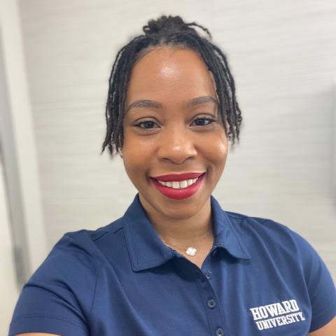 Profile headshot photo of KESHALA FLUKER.