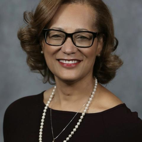 Profile headshot photo of Lisa Slade, DDS.
