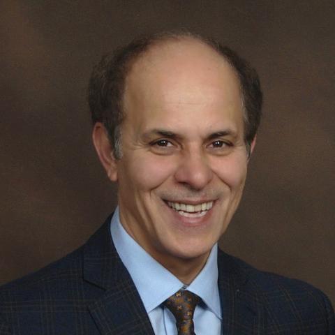 Profile headshot photo of Mohsen Mosleh.