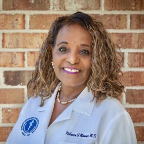 Profile headshot photo of Kebreten Manaye, MD.
