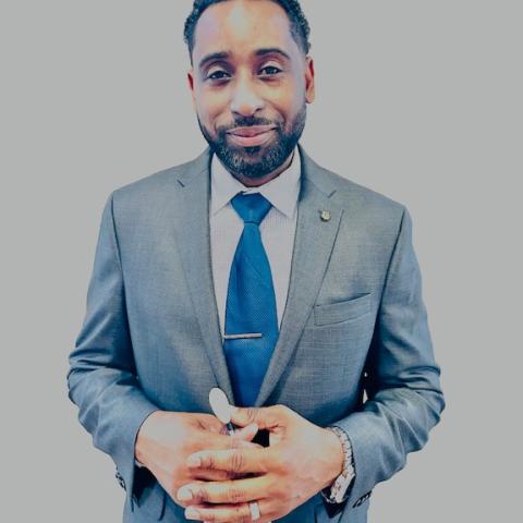 Profile headshot photo of Chancellor Deon Mills.
