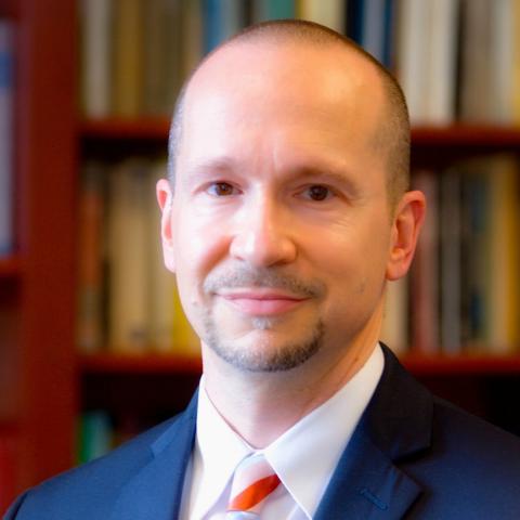 Profile headshot photo of Thomas A. Foster.