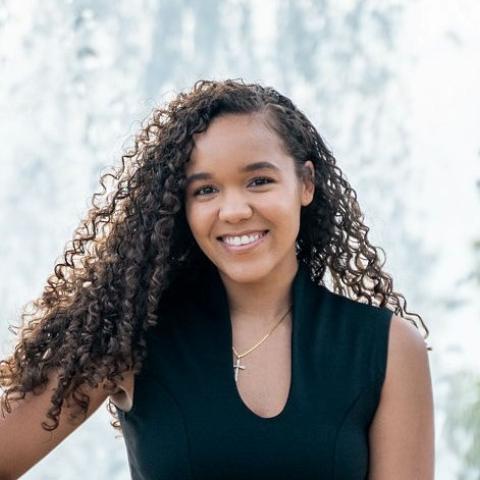 Profile headshot photo of Michaela Gibbons.