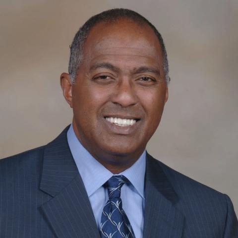 Profile headshot photo of Hugh Mighty, M.D..