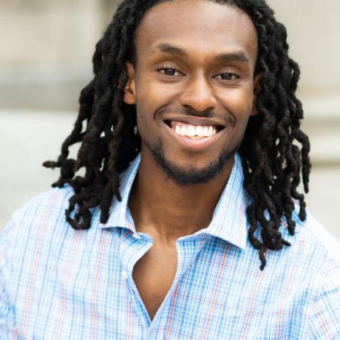 Profile headshot photo of Travis Brown.