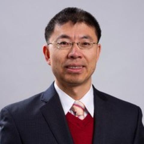 Profile headshot photo of Xiankui Hu.