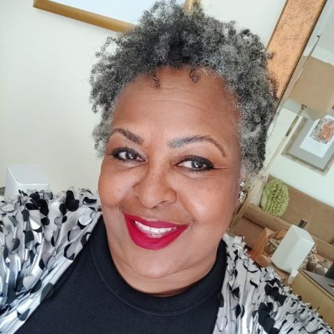 Profile headshot photo of Lorra Rivers.