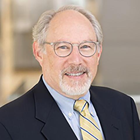 Profile headshot photo of Andrew Gavil.