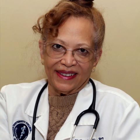 Profile headshot photo of Millicent Collins.