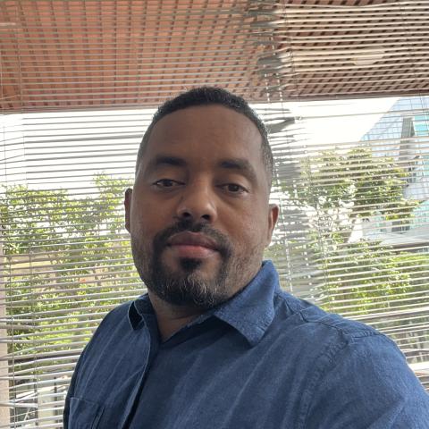 Profile headshot photo of Tibebu  Getachew Ayalew.
