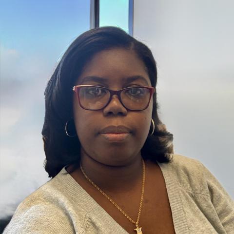 Profile headshot photo of Renee Grant Tyer.