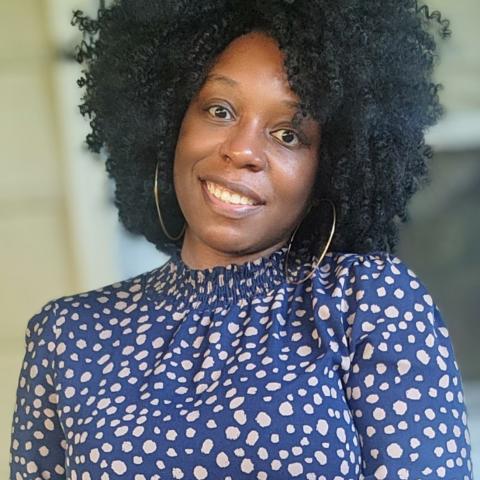 Profile headshot photo of Natasha Dennis.