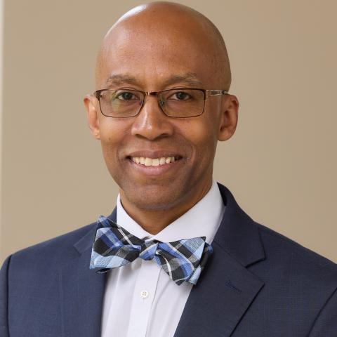 Profile headshot photo of David Bowman, M.D., DipABLM, FACLM.