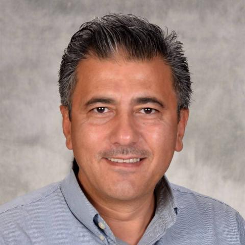 Profile headshot photo of Muneer Abbas, Ph.D..