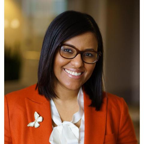 Profile headshot photo of Taidine Lopes Bedney, MD, FACOG.