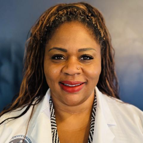 Profile headshot photo of Kimberley Farmer, MD, FACOG.