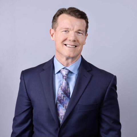 Profile headshot photo of Mike Farrell.