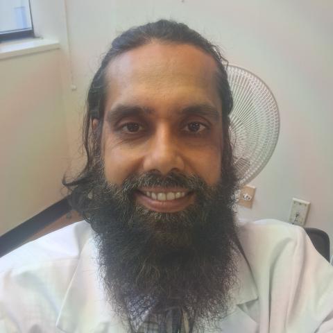 Profile headshot photo of Aamir Sheikh, D.D.S..