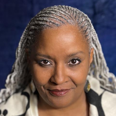 Profile headshot photo of Angela Powell Walker.
