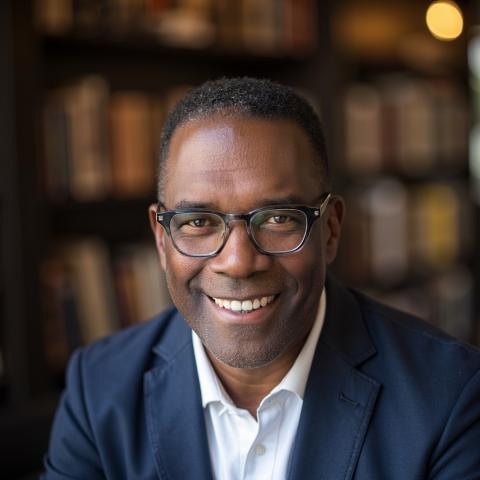 Profile headshot photo of Bruce Clark.