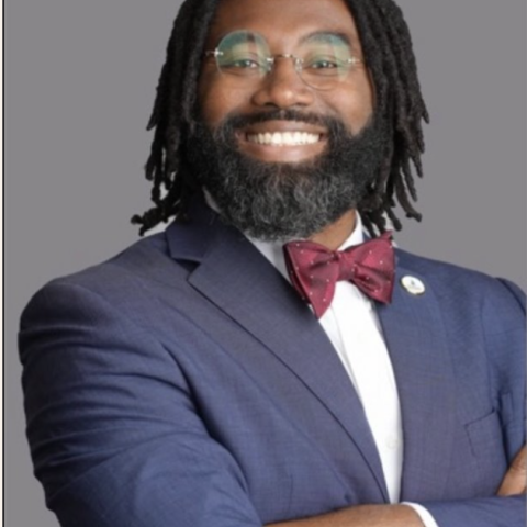 Profile headshot photo of J. Elijah Bratton, PhD.