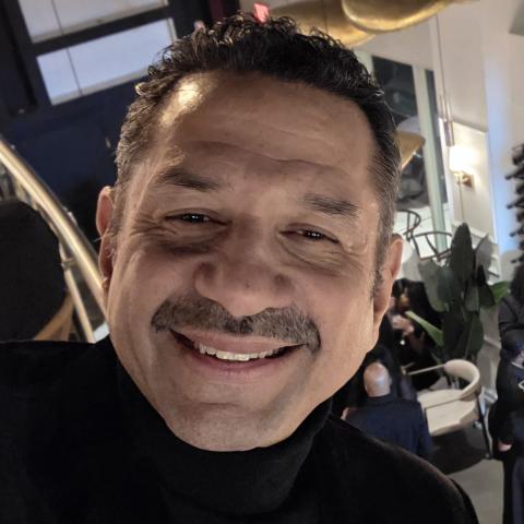 Profile headshot photo of Bernard Woolfolk.