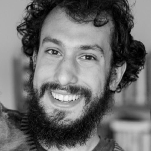 Headshot photo of Sam Hopkins