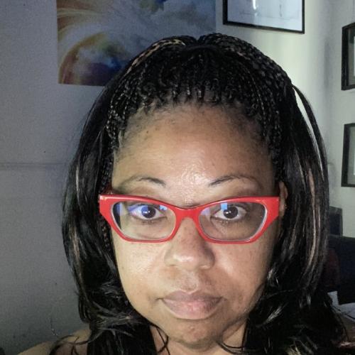 Head shot of Dr. Aisha Bonner, a Black woman with red glasses