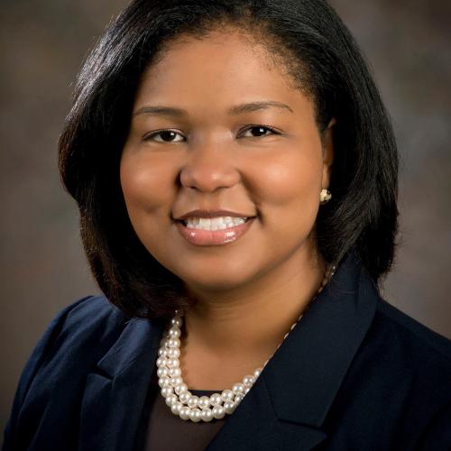 Photo of Lakia Young, Black female with shoulder length hair in Navy Blazer