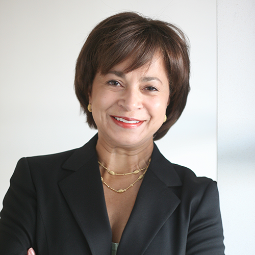 Florence Prioleau smiling wearing a black blazer.