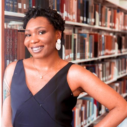Milaun Freeman pictured in the stacks of the library. 
